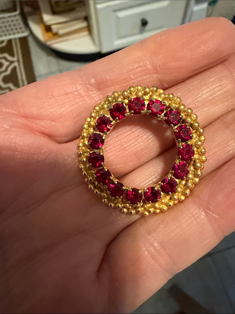 Vintage Gold-Tone Circle Brooch with Red Crystals